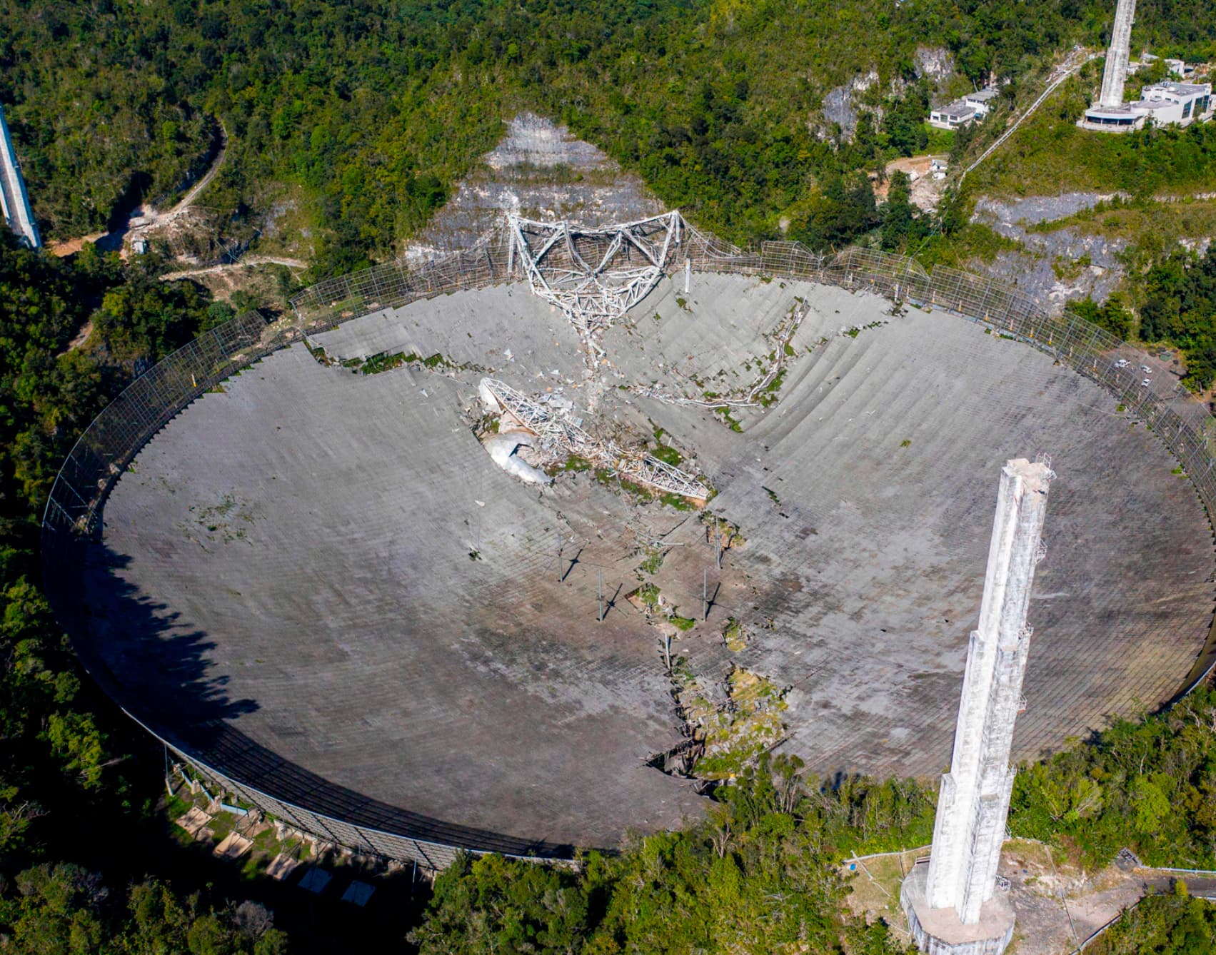 Though the Arecibo Telescope in Arecibo, Puerto Rico may have famously helped us look up at the stars, it quickly became acquainted with the ground. After weathering years of intense storms and hurricanes throughout the 2010s, the telescope collapsed on August 10, 2020 when an auxiliary cable came unlatched to a platform keeping the structure intact. 